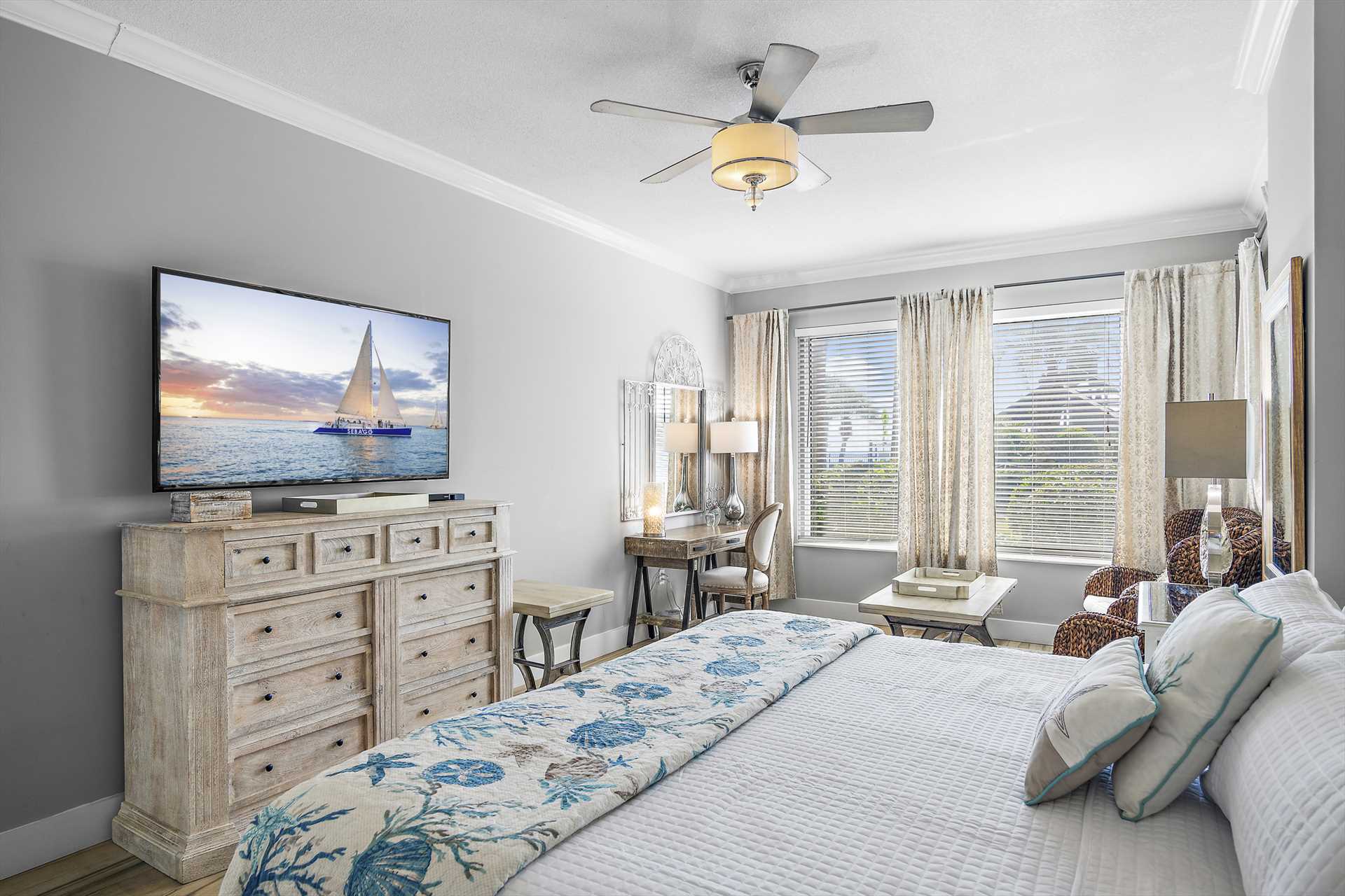 Wake Up in Paradise - The primary bedroom offers cozy beddin