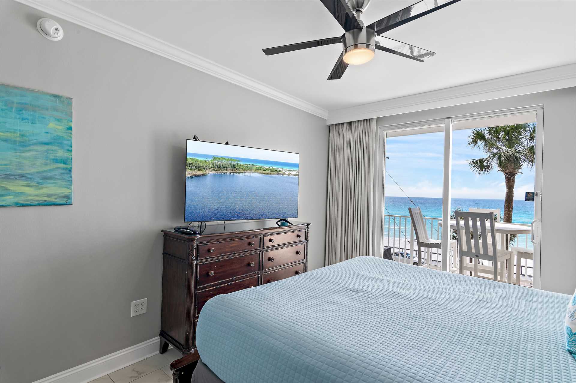 King primary suite with balcony access and gulf iewsKing pri
