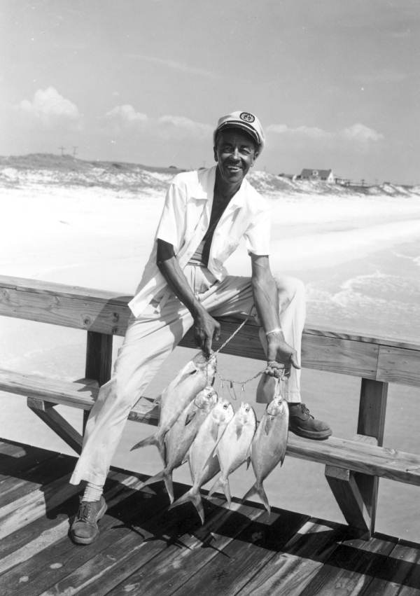 Captain Reddin Brunson displays his catch of fish on the pier at the Destin Rodeo - Destin, Florida1956