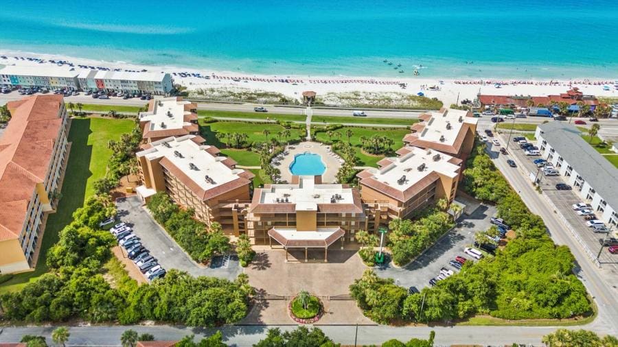 Mediterranea destin | Beach Condos in Destin Mediterranea Destin, Lush landscaping and pool at Mediterranea. Vacation rentals with large pool, hot tub, tennis courts, exercise facility and a private beach.