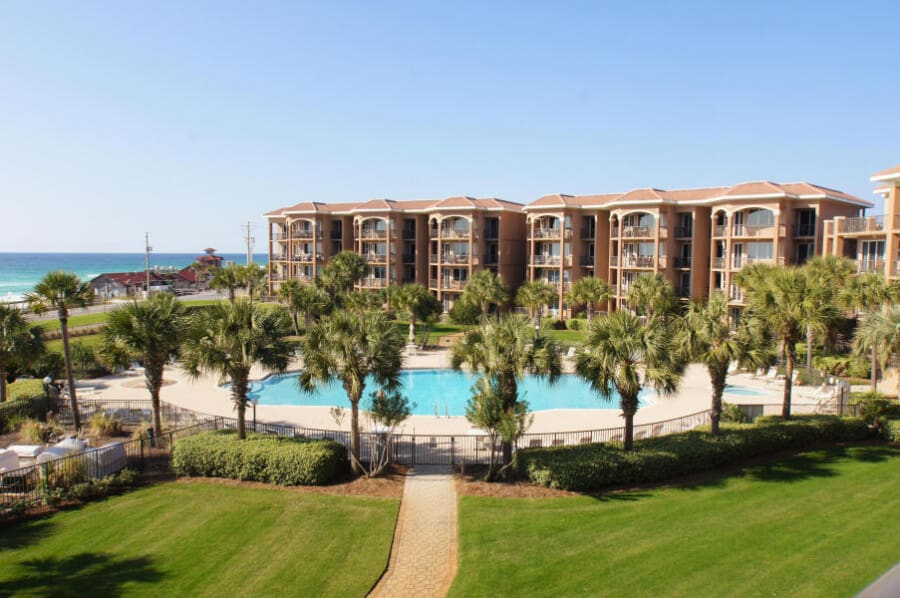 Beach Condos in Destin FL | Book Vacation Rentals Online #Lush landscaping and pool at Mediterranea. Vacation rentals with large pool, hot tub, tennis courts,  exercise facility and a private beach.  