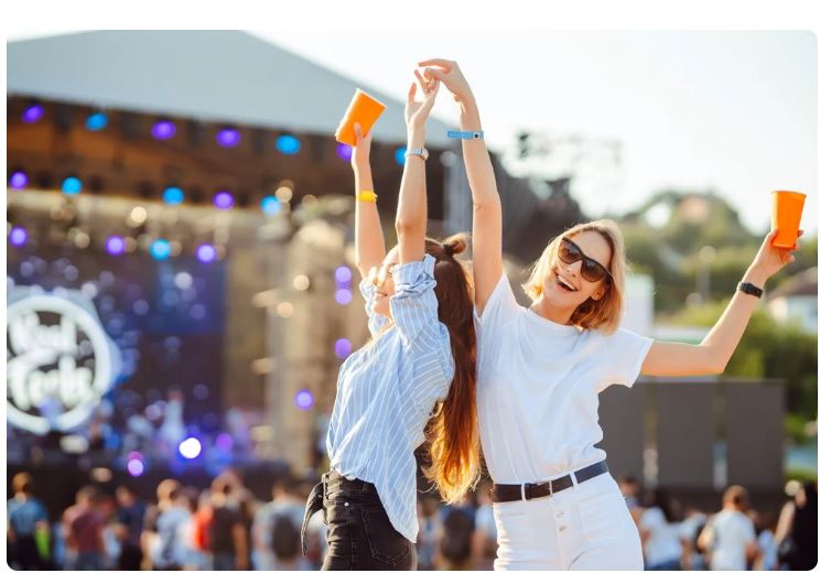 women dancing to music